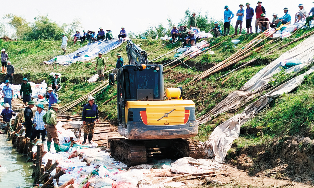  Bảo đảm an toàn đê bối  và không gian thoát lũ